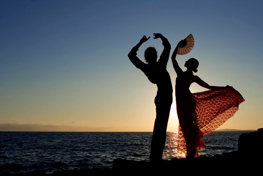 Dancing couple at the beach