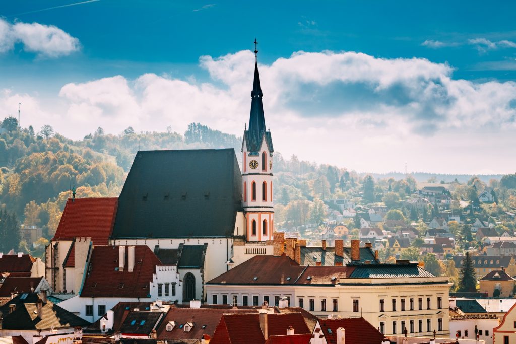 St. Vitus Church and townscape of Cesky Krumlov on a sunny autumn day, Czech Republic.