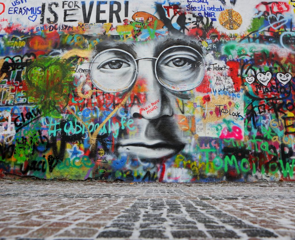 The Lennon Wall in Prague is covered with graffiti inspired by John Lennon.