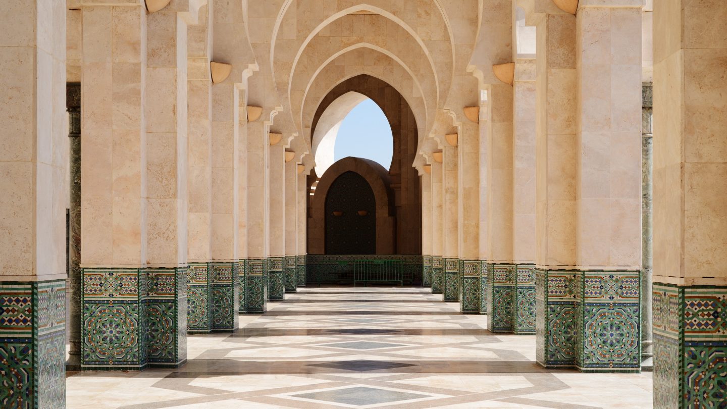 Explore the arcades of the Hassan II Mosque in Casablanca in Morocco.