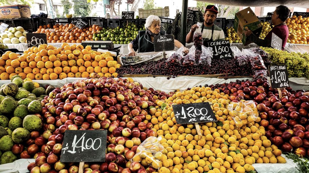 Enjoy fresh fruit and vegetables at a local market in Chile