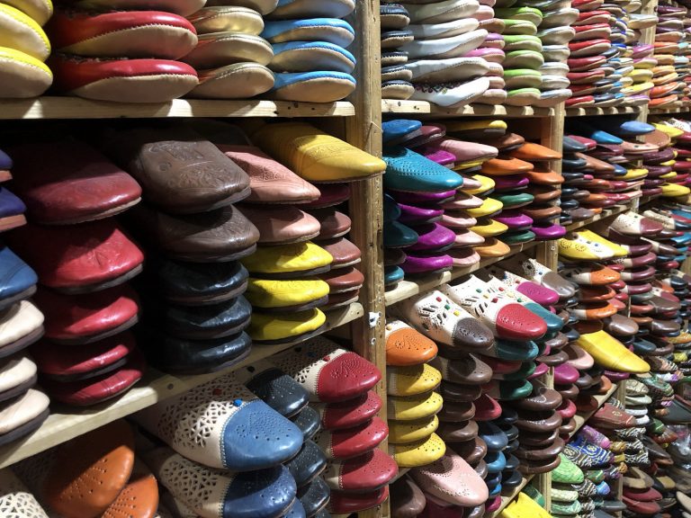 Colorful leather babouches at a market in Fez, Morocco.